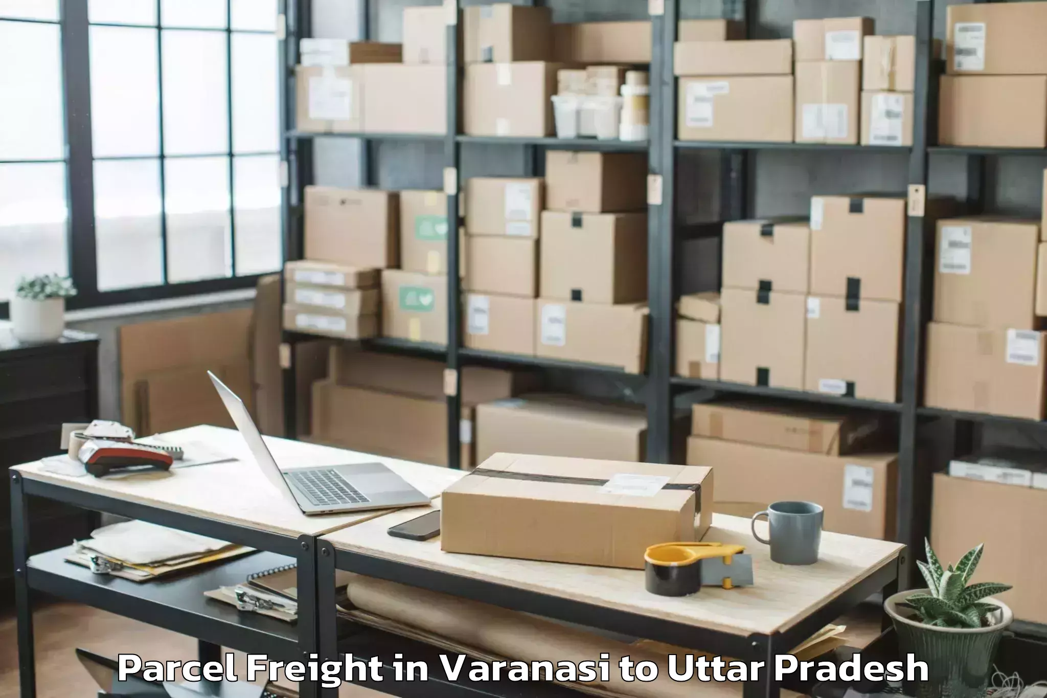 Book Varanasi to Maghar Parcel Freight